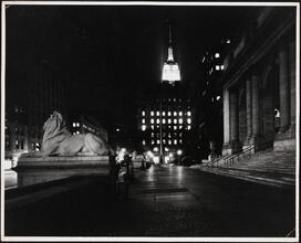 [Looking south from the steps of New York Public Library's main branch toward the Empire State Building.]
