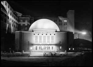 [200 Central Park West. American Museum of Natural History. Exterior, night view.]