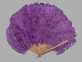 Folding feathered fan of purple ostrich feathers