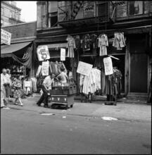 [Shoe store and clothing store on Orchard Street.]
