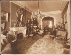 [Residence. Interior, parlor.]