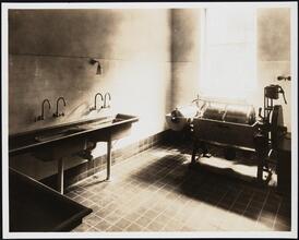 [Hospital. Interior, laundry.]