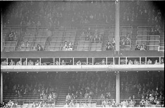 Football Writers [Fans in the stadium.]