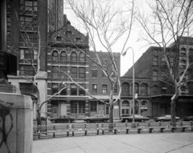 [Looking at 168, 170, and 172 Duane Street from Duane Park.]