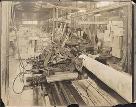 [Interior of marble works, cutting pillar.]