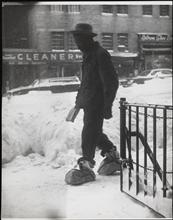 Black man with bottle and paper bag shoes, Madison Avenue between 96th and 97th Sts.