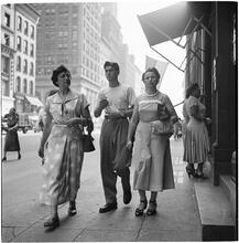 New York City Scenes: Fashion Shots [Group of men and women walking down the street.]