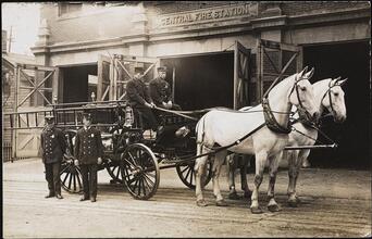 [Horse-drawn fire engine outside the Central Fire Station.]