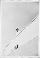 [Crew member on the ferry.]