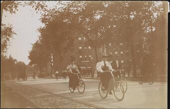 [People riding bicycles.]