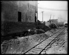 Sea Beach Line cut supporting building foundation, Fort Hamilton Parkway.