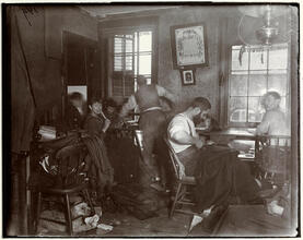 "Knee-pants" at forty five cents a dozen -- A Ludlow Street Sweater's Shop.