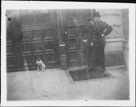 [Firemen with dog.]