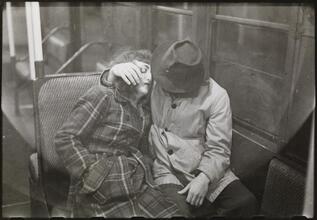 Life and Love on the New York City Subway [Couple sleeping on a subway.]