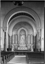 Our Lady of Angels Church. Vertical of Chancel - reflected light of altar.