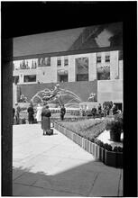 Rockefeller Center. City Garden Club and fountain through frame.