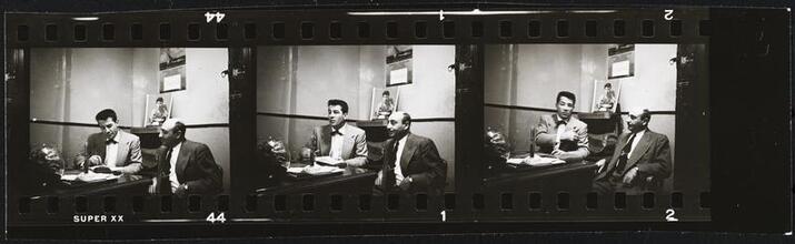 Rocky Graziano, He's a Good Boy Now [Rocky Graziano with a man in an office.]