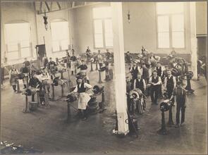 [Workers in a Brooklyn Rapid Transit machine shop.]