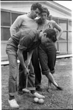 Leonard Bernstein [Leonard Bernstein and two friends playing croquet.]