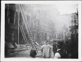 [Firemen at scene of fire.]
