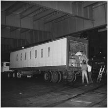 [Unloading a truck.]