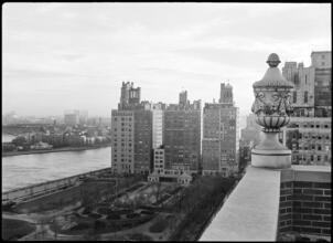 [View from a roof looking to the East River and Roosevelt Island.]
