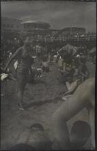 [Coney Island beach with Steeplechase Park in background.]