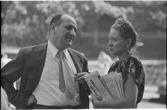 Street Conversations [Man and woman talking.]