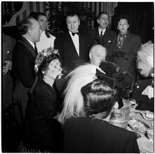 Champagne Cholly Book Party [People socializing.]