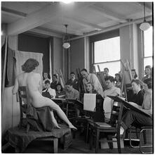 Columbia University [Students drawing a nude in art class.]