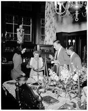 Guy Lombardo [Guy Lombardo's family eating dinner.]