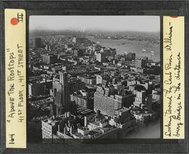 Above the rooftops. 41st floor, 41st Street. Looking toward the East River. Williamsburg Bridge in the distance.
