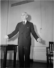Dale Carnegie [Dale Carnegie teaching a class on public speaking.]