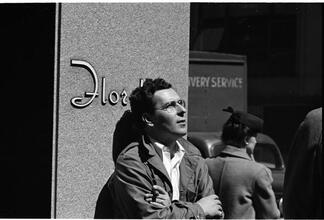 People Waiting [Candid shots of a man waiting in front of Florsheim Shoes.]