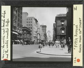 Fifth Avenue. North from 50th Street. Here are the world's most lavish shops and the world's smartest traffic.
