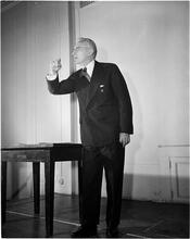 Dale Carnegie [Dale Carnegie teaching a class on public speaking.]