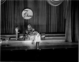 Swing Band Contest Sponsored by LOOK [Band with singer, performing on stage.]
