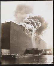 [Warehouse on fire.]