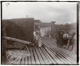 Scene on the roof of the Barracks (no. 116), naked children.