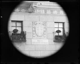 University Club seal on building wall.