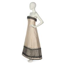 Evening dress in white silk gazar with black bead trim