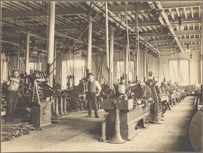 [Workers in a Brooklyn Rapid Transit machinery shop.]