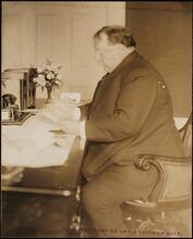 [President Taft at a desk.]