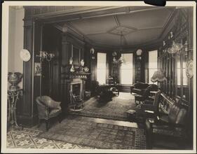 [Residence. Interior, parlor.]