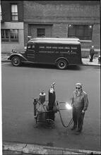 Paddy Wagon [Man with welding equipment used in the making of the television show Paddy Wagon.]
