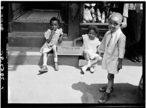 Children on a Harlem Doorstep.