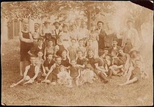 [Group in front of trees in summer apparel.]