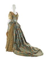 Evening dress in blue satin brocaded with salmon pink flowers