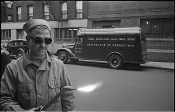 Paddy Wagon [Man with welding equipment used in the making of the television show Paddy Wagon.]