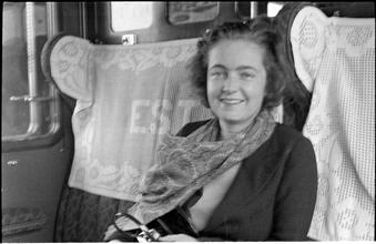 [Felicia Marsh in train car.]